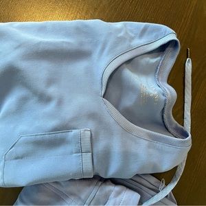 Jaanuu scrub top and joggers in ceil blue